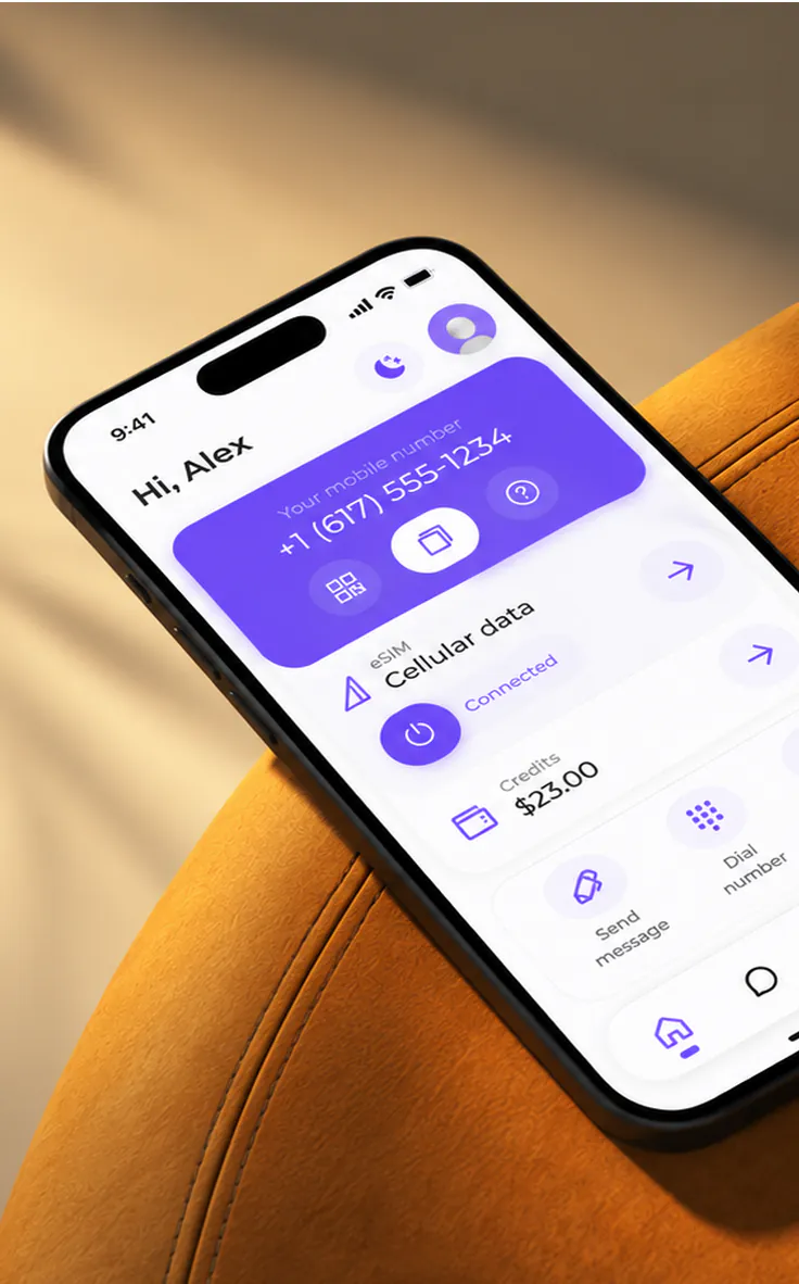 Ecrã inicial da app SLYNUMBER num telemóvel pousado numa poltrona